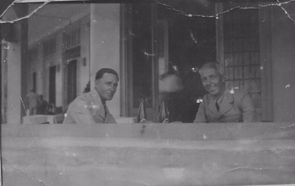 RAF 113 squadron A cold beer in Tel Aviv W/O Dick Allen on right, other unknown
