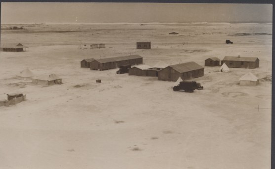 113 Squadron, believed to be Mersa Matruh - 1938 or 1939 during photo
survey of desert. Note Hind with 113 on fuselage in lower right. Upper left appears
to be train cars? In the top photo there appears to be a tank dug in upper center.
SOURCE/COPYRIGHT: John Allen, son of F/Sgt (W/O) Dick Allen