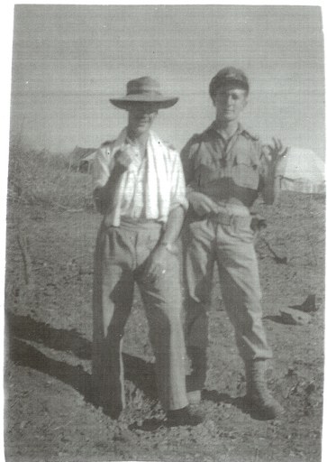 113 Squadron Zayatkin Burma. Picking up shrapnel. FLt Stan Chilton on right-FO Colin Ellis left